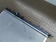 Kühler Peugeot 206 2KFX/2NFZ/ 99000629