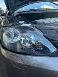 Hauptscheinwerfer rechts VW Golf V Plus (5M, 521) 5M1941006G