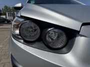 Chevrolet Aveo 2 original Scheinwerfer vorn rechts Halogen tiefer Kratzer mittig Bj.2013 