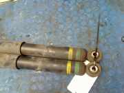 Stoßdämpferset Hinten 56210JX50C Nissan NV 200 Evalia (M20M) Bus 1.6 16V (HR16DE) 2013-09