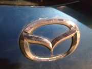 Emblem Mazda 2, DE 2007.10 - 2014.06 Gebraucht ,