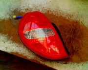 Rücklicht Links Daihatsu Sirion/Storia (M1) Schrägheck 1.0 12V DVVT (EJ-VE) 2001-08
